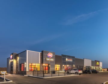 Retail center in Blackfalds Alberta with a Dairy Queen, King Liquor and Buster's Pizza